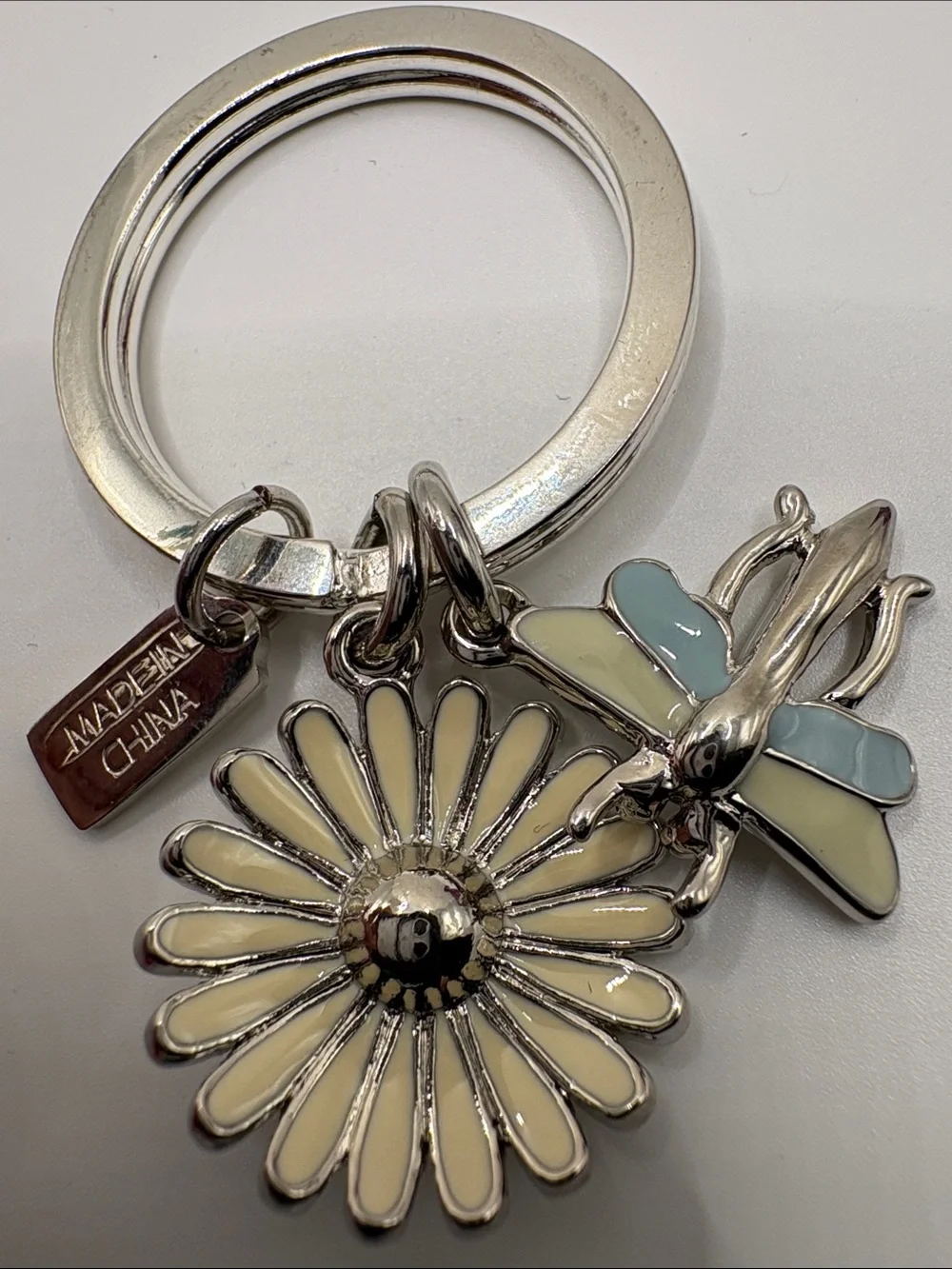 COACH Silver Daisy and Pastel Butterfly Keyring with Yellow Center